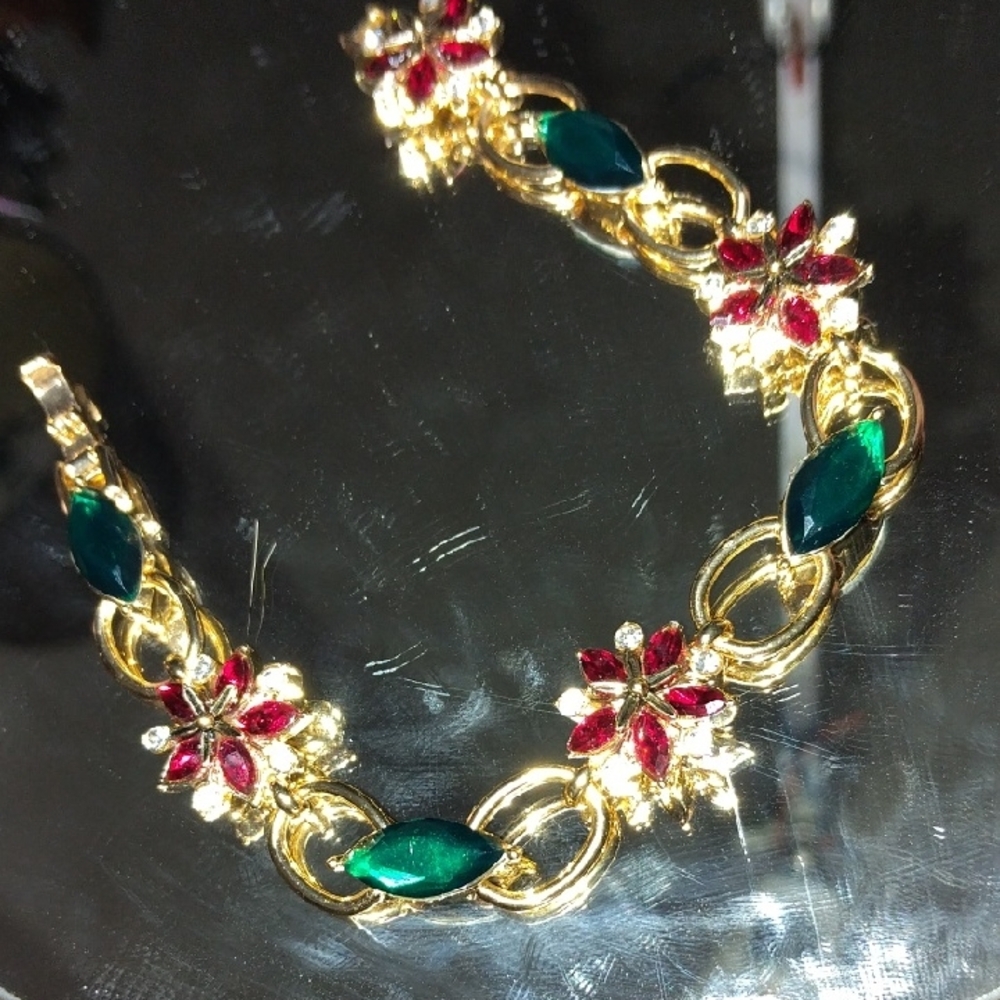 Elegant Gold Bracelet with Red and Green Floral Design